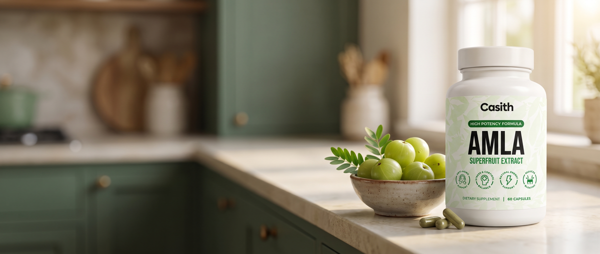 Casith Amla Superfruit Extract bottle on a kitchen counter beside a bowl of fresh amla fruit